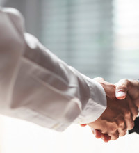 Recruiting Agent Shaking Hands With Candidate