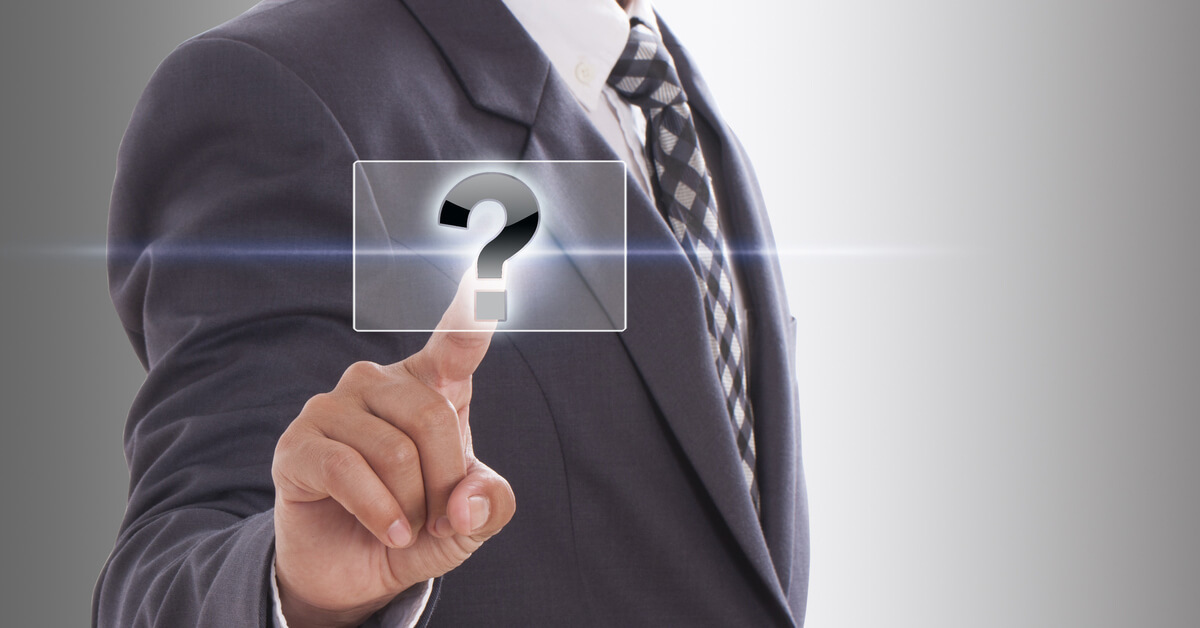 Businessperson Pressing Question Mark On Touch Screen Interface