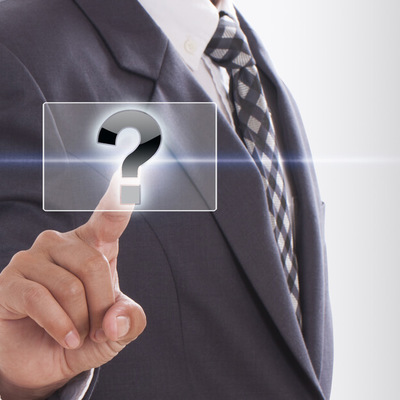 Businessperson Pressing Question Mark On Touch Screen Interface
